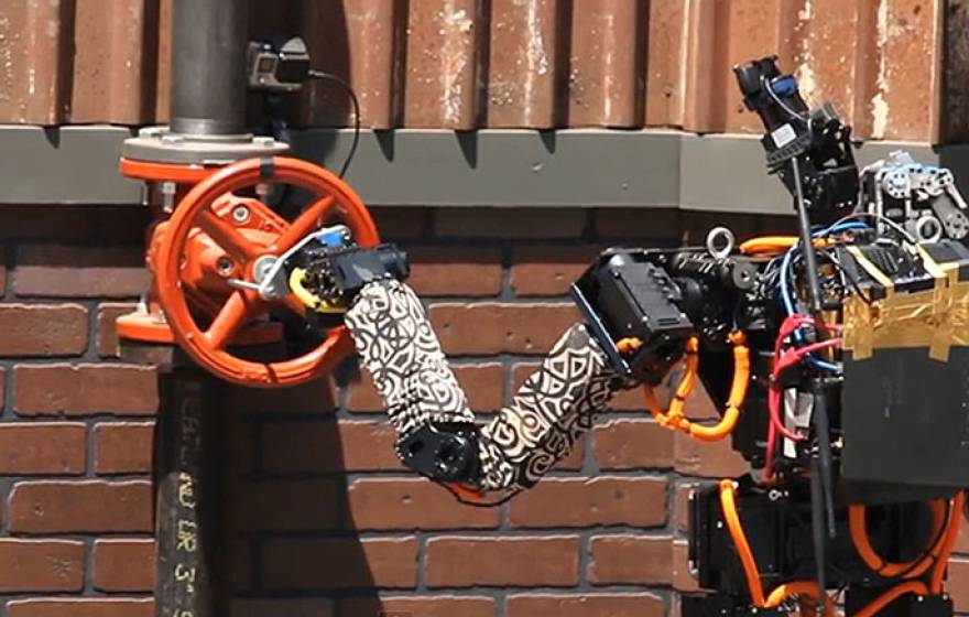 THOR robot turns a valve