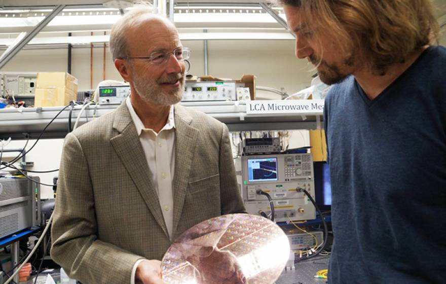 UC Santa Barbara's John Bowers (left) is among 12 UC innovators elected to the National Academy of Inventors.