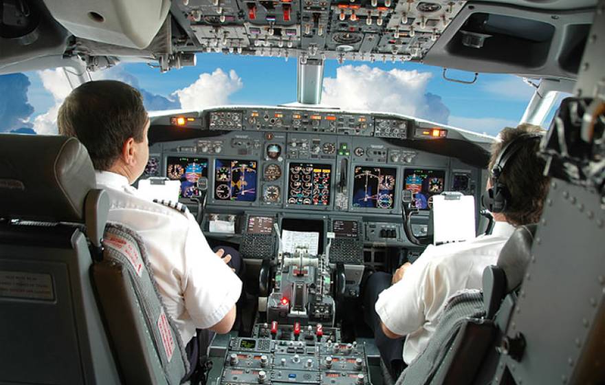 pilots in cockpit