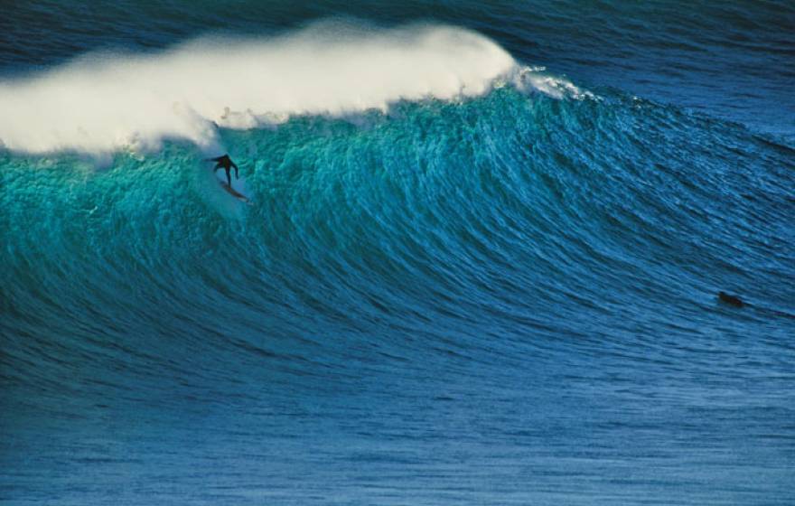 Surfer surfing on a big wave