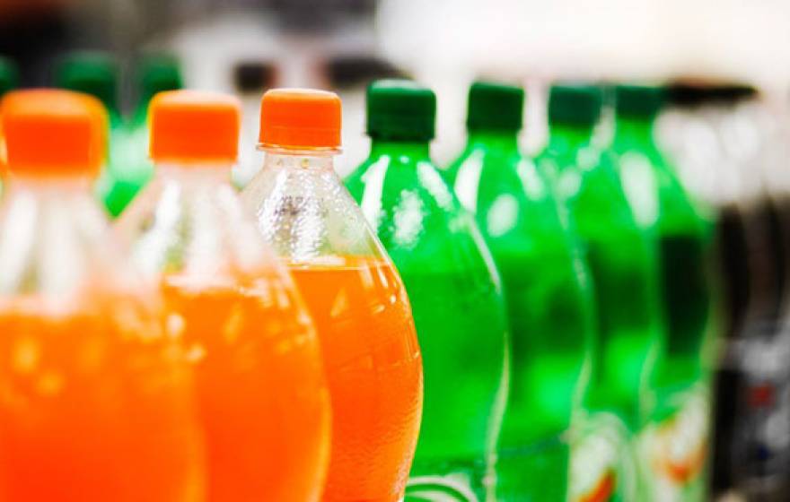 Colorful soda bottles in a market