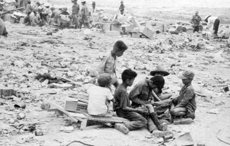 Vietnam devastation kids in the rubble