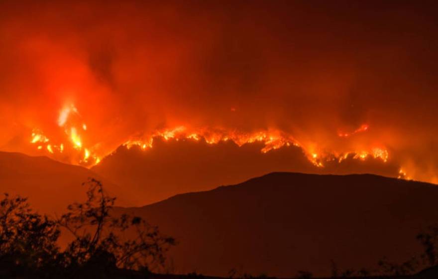 A raging red fire on a ridge