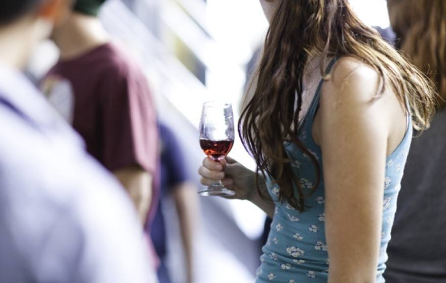 woman holding wine glass