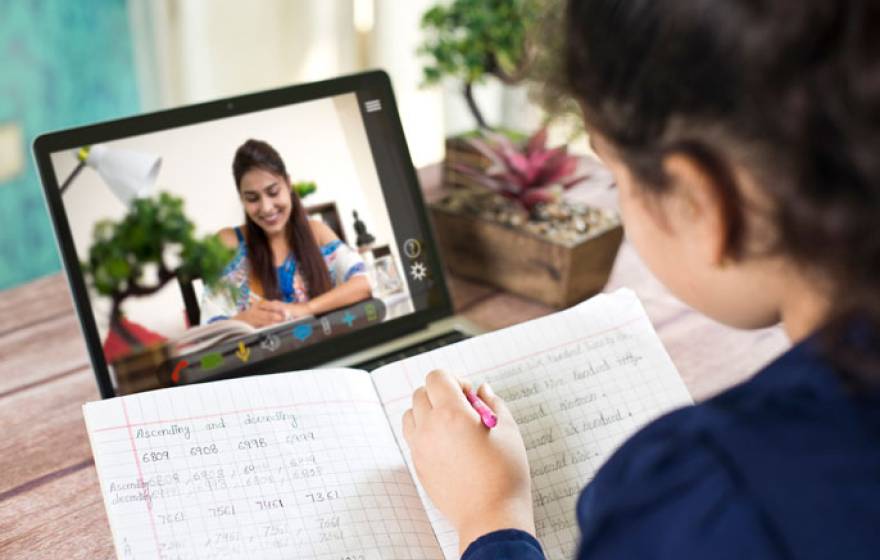 Child taking classes on the computer