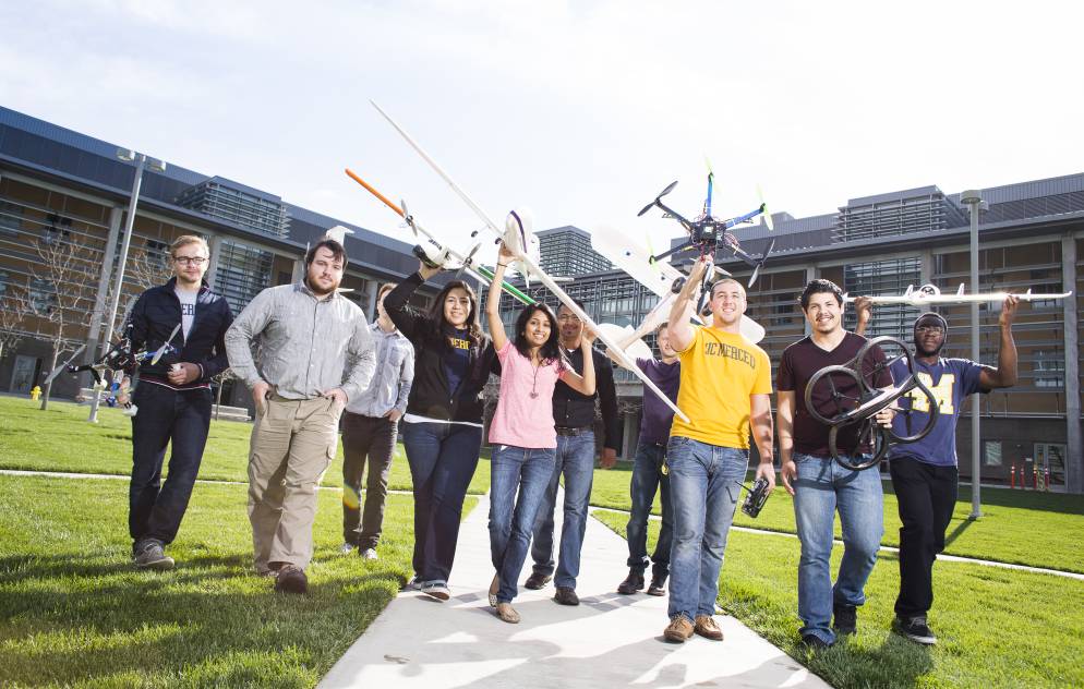 a group of UC Merced students with drones and airplanes they've built
