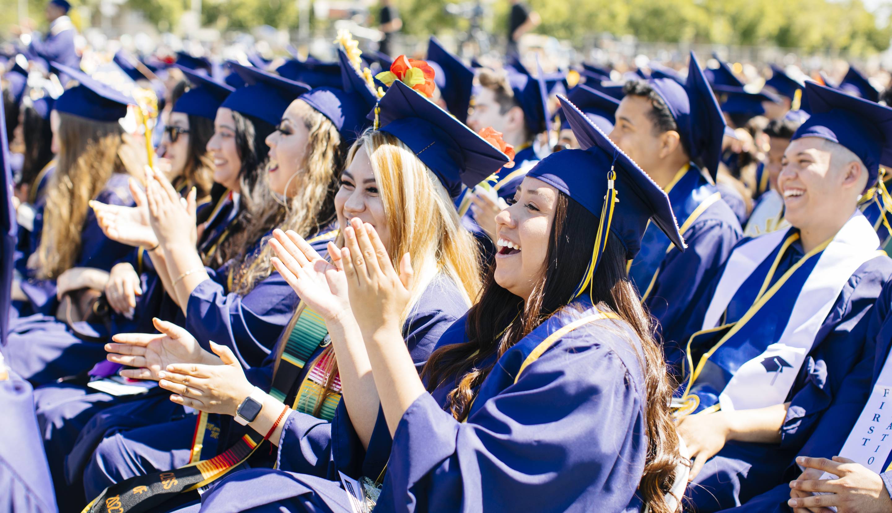 Students clapping at UC Merced graduation ceremony
