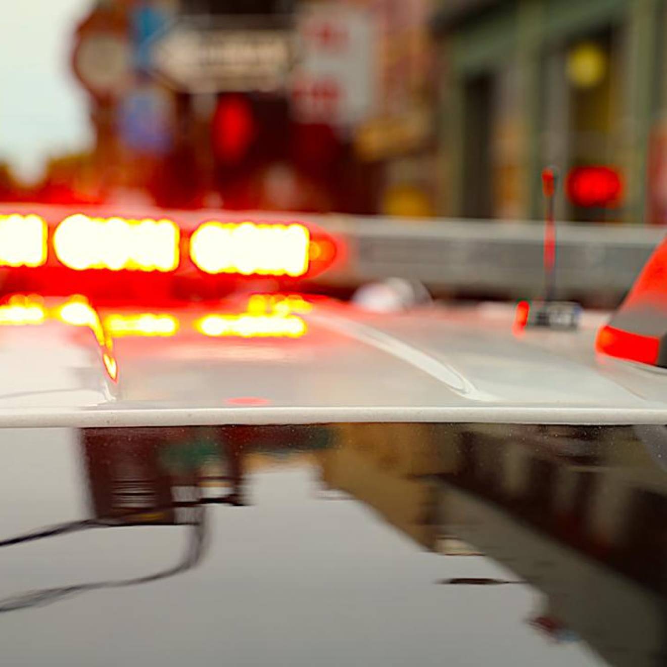 Lights flashing on top of a police car