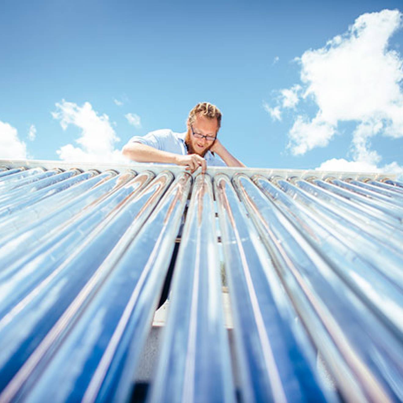 Man on solar tubing