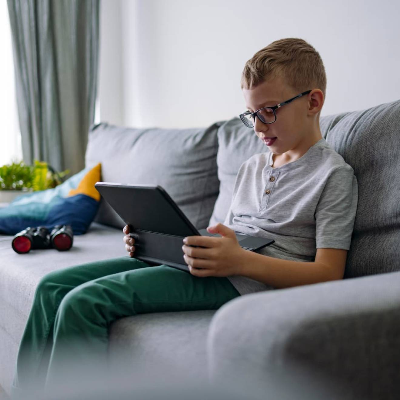 child looking at a tablet
