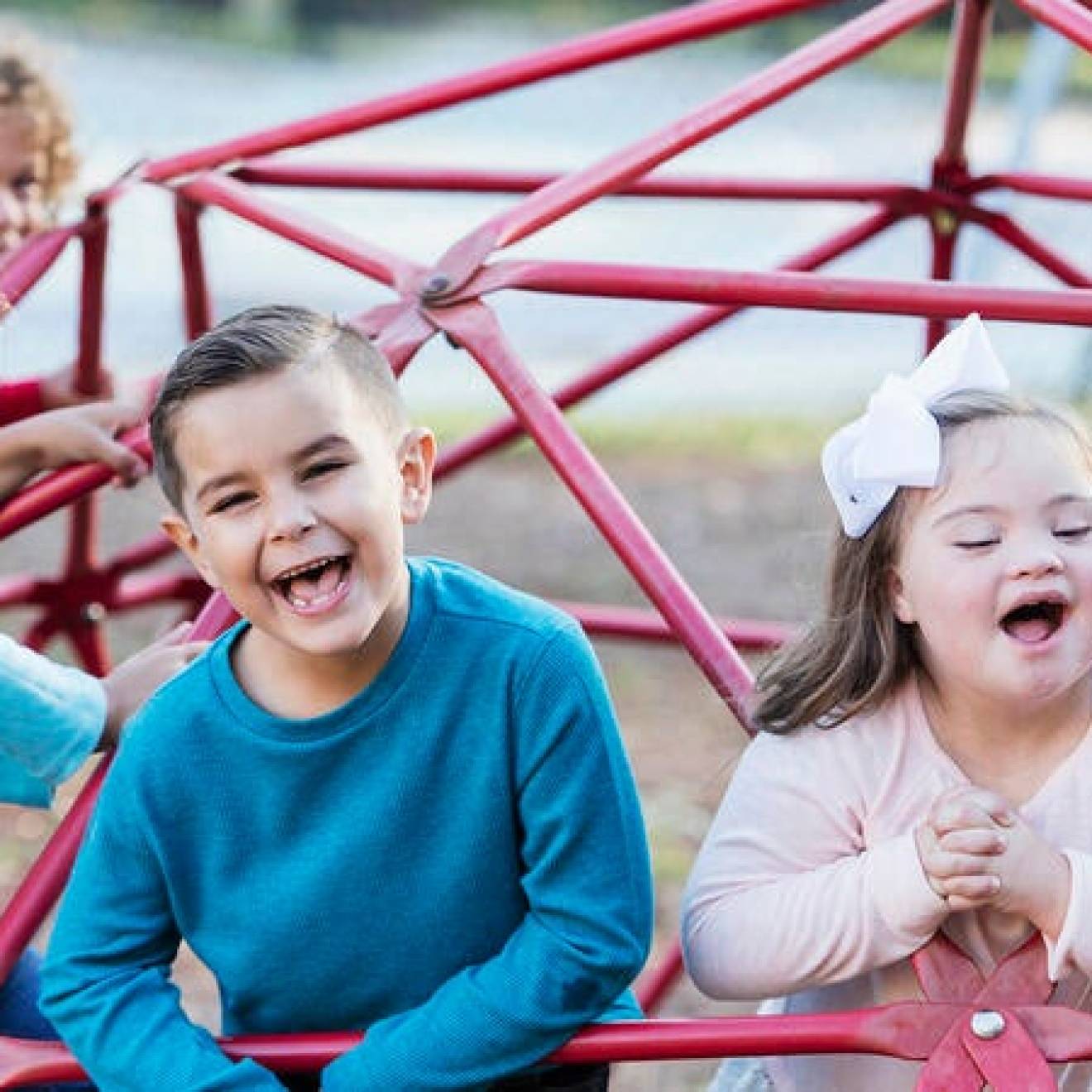 A diverse group of happy children on a playground