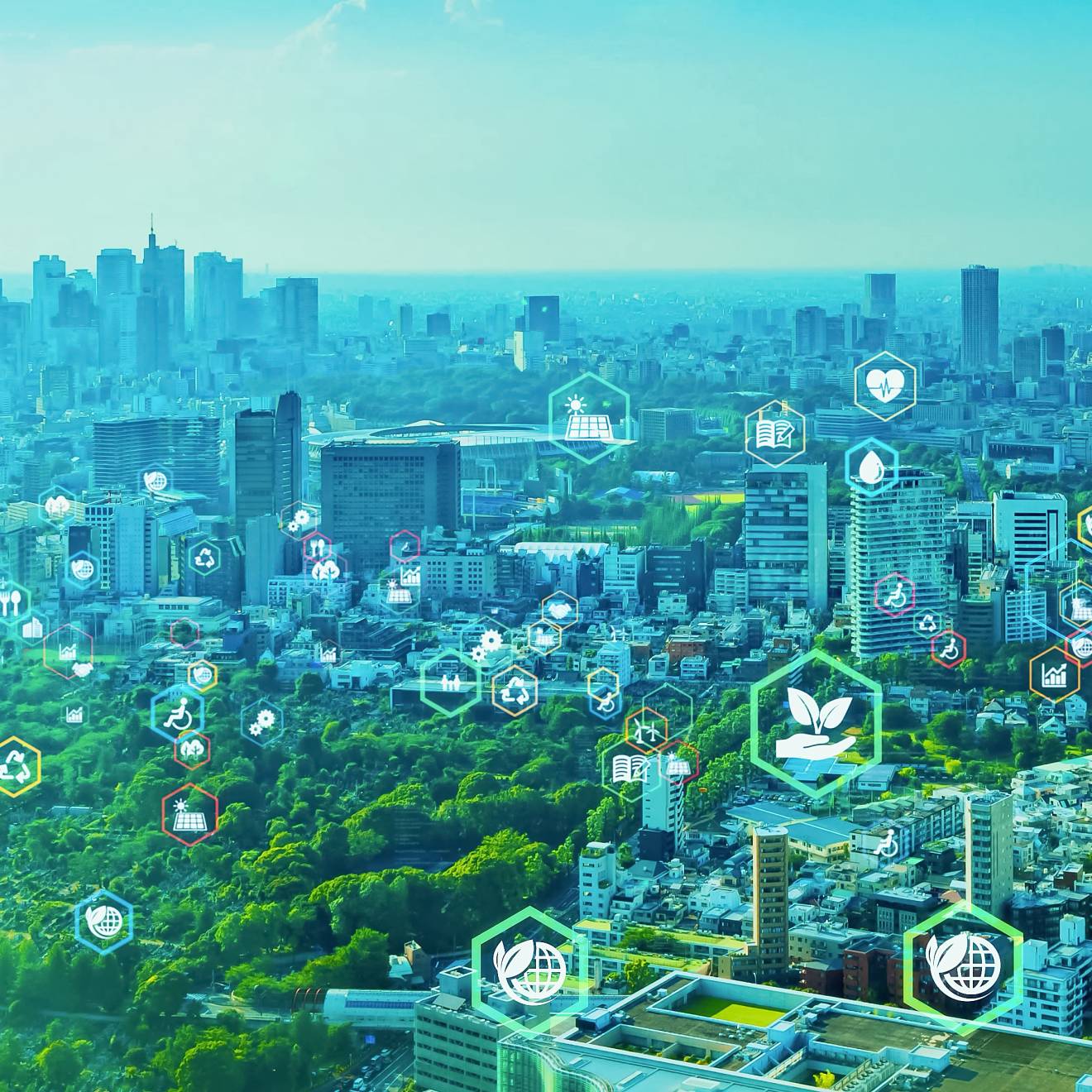A green cityscape with eco-icons on it