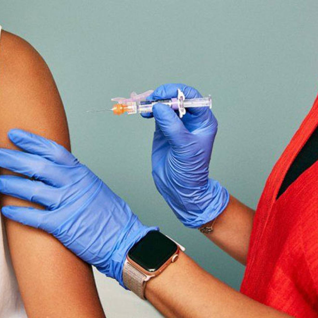 Nurse giving a flu shot to someone