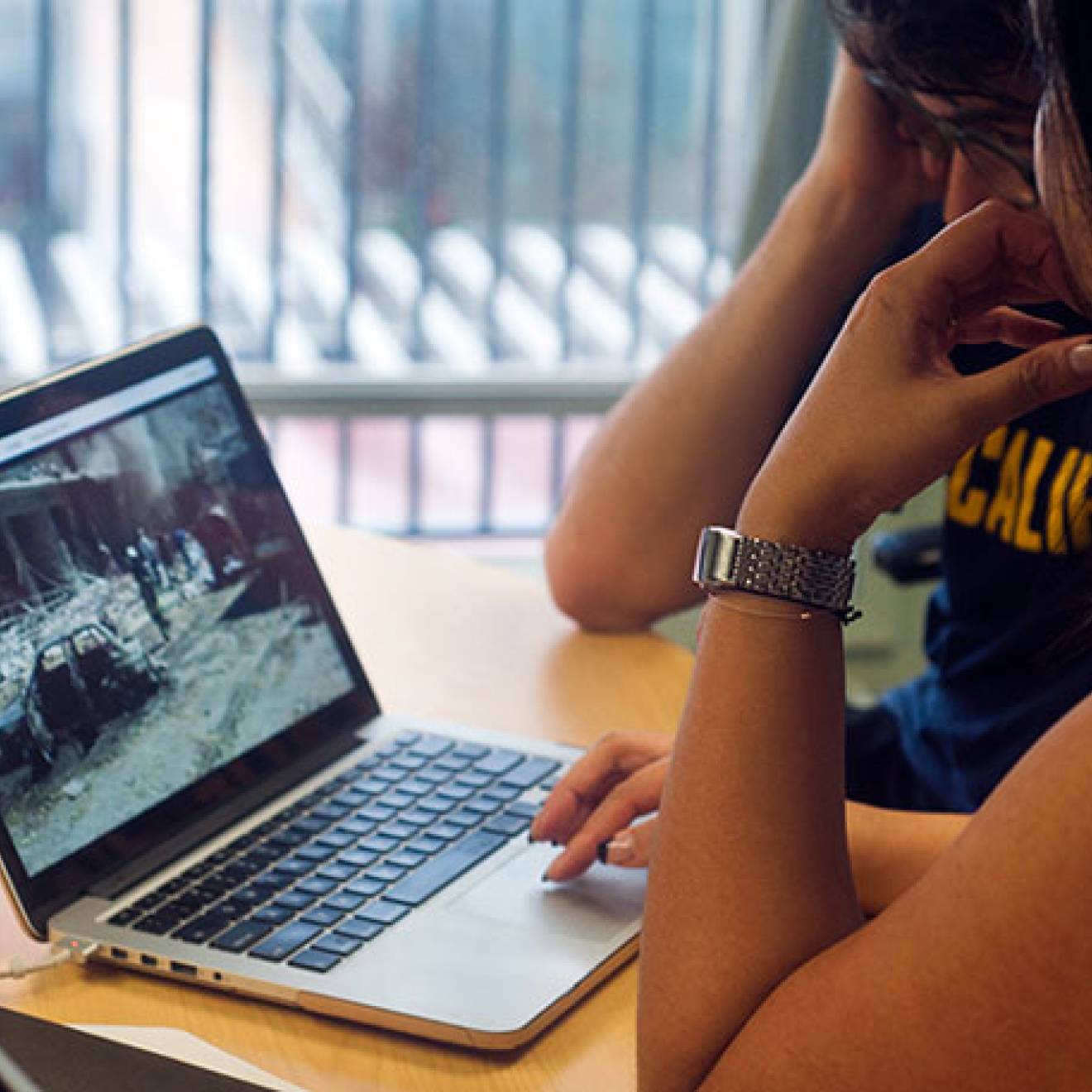 Person watching a video on a computer