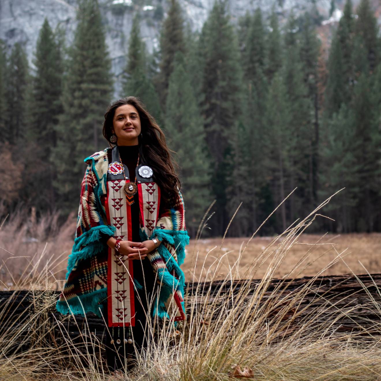 Irene Vasquez at Yosemite in traditional tribal clothing