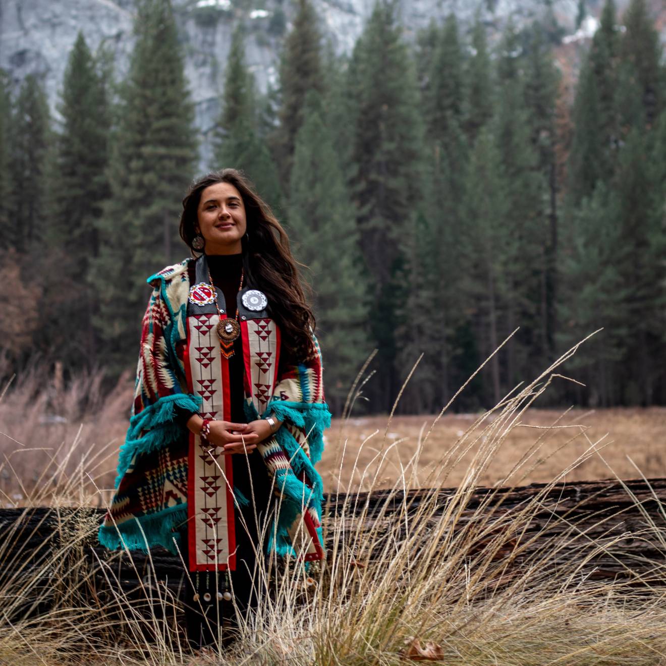 Irene Vasquez at Yosemite in traditional tribal clothing