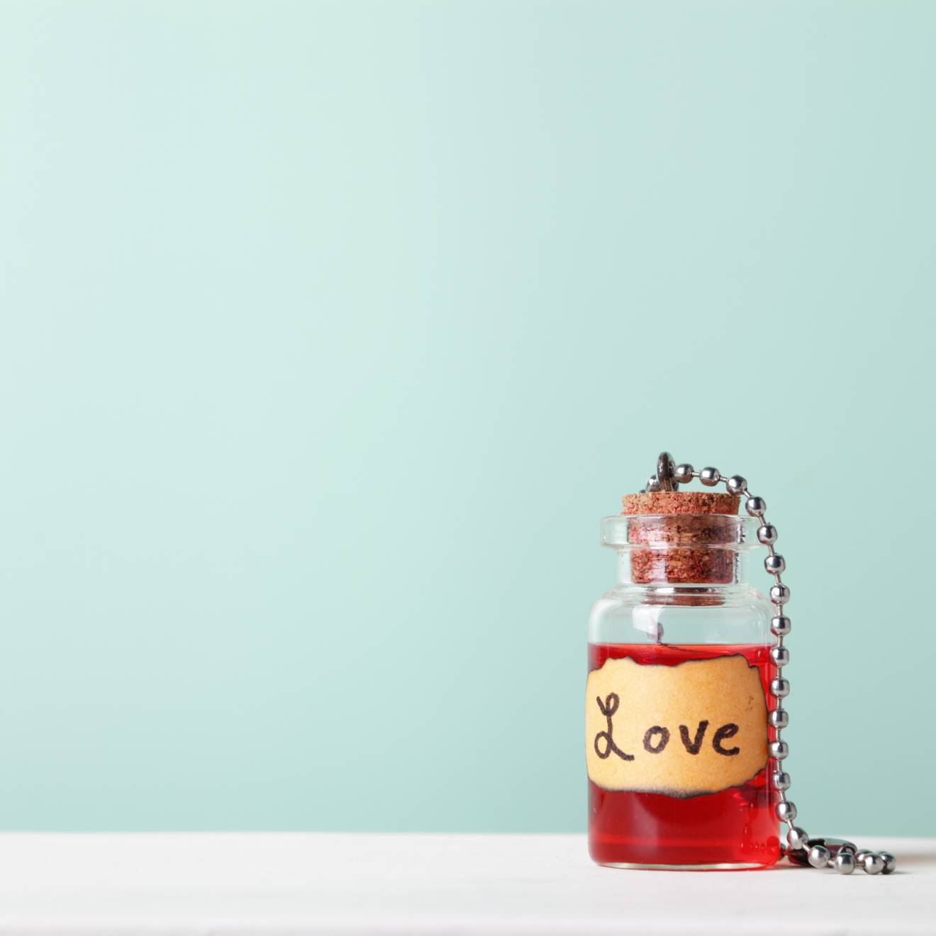 A little potion bottle that says Love