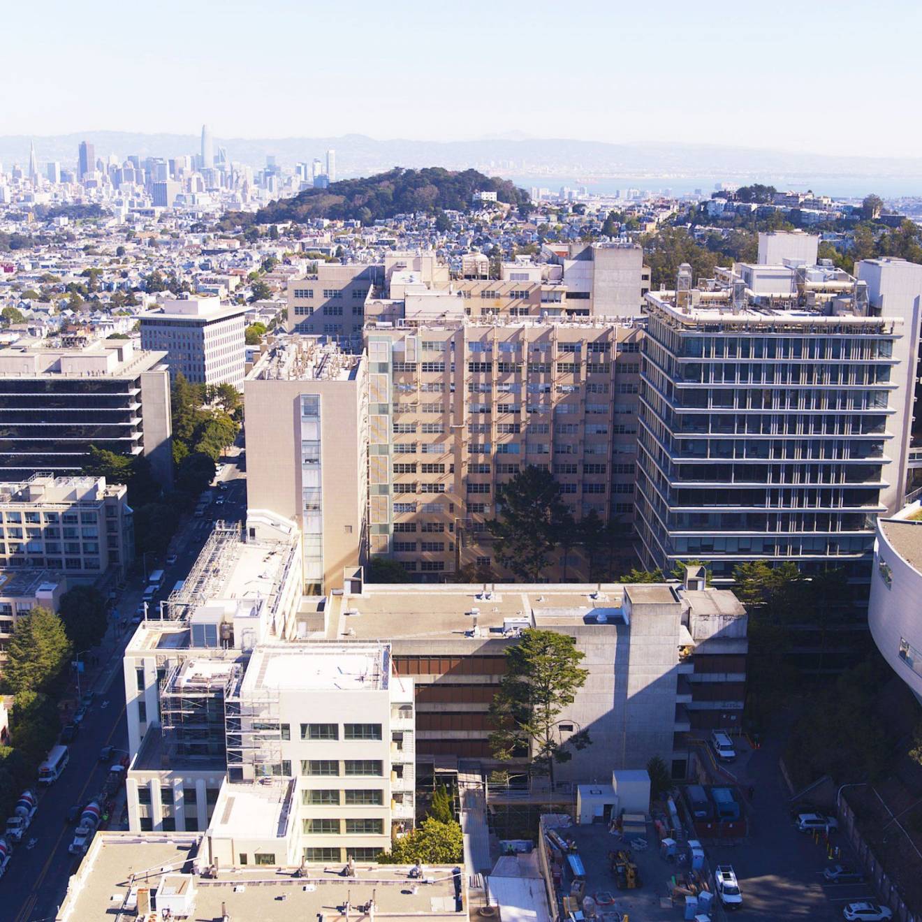 Aerial view of the Parnassus campus in San Francisco, skyline in the background