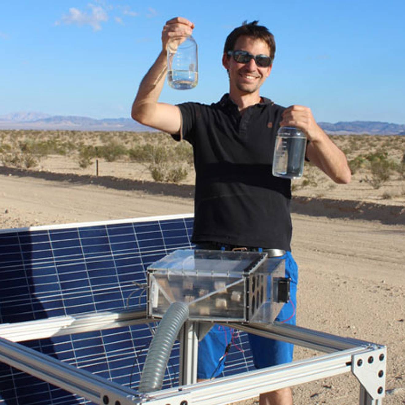 Mathieu Prévot displays water collected by the harvester