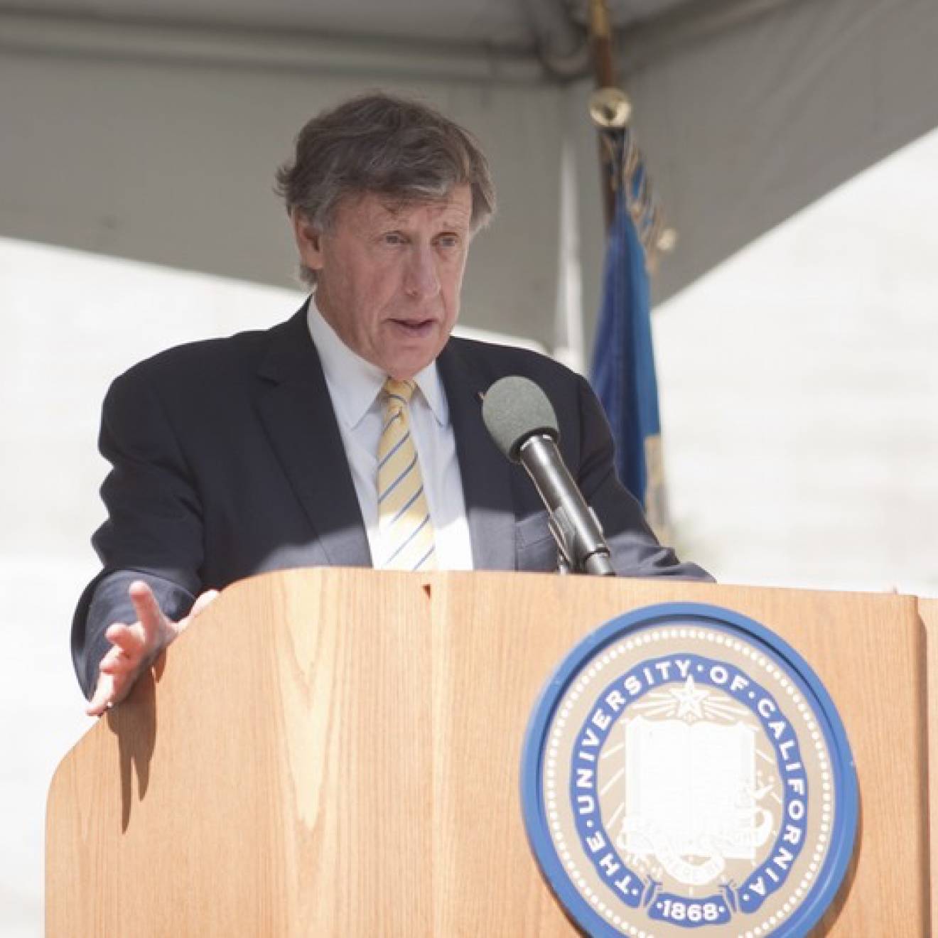 UC Regent Richard Blum at a UC podium