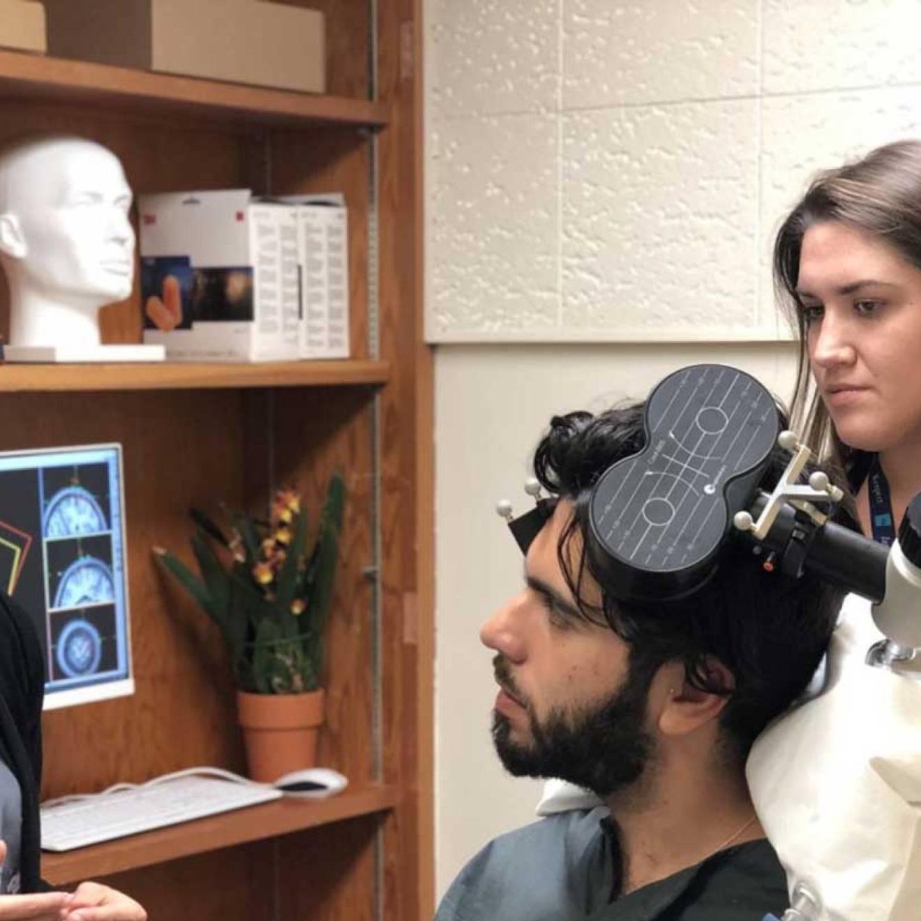 a doctor works with a patient