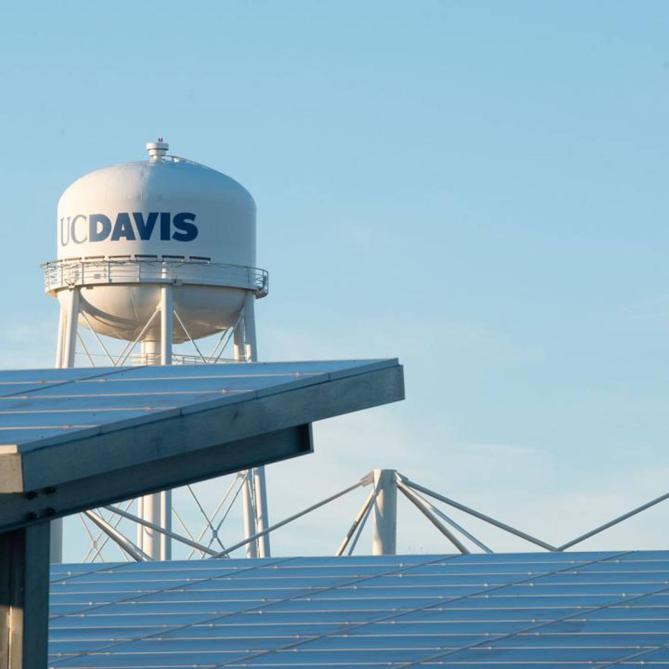 UC Davis water tower with solar panels in front