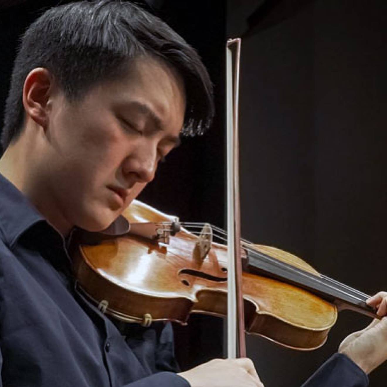 Elvin Hsieh playing the Stradivarius violin that was already owned by UCLA