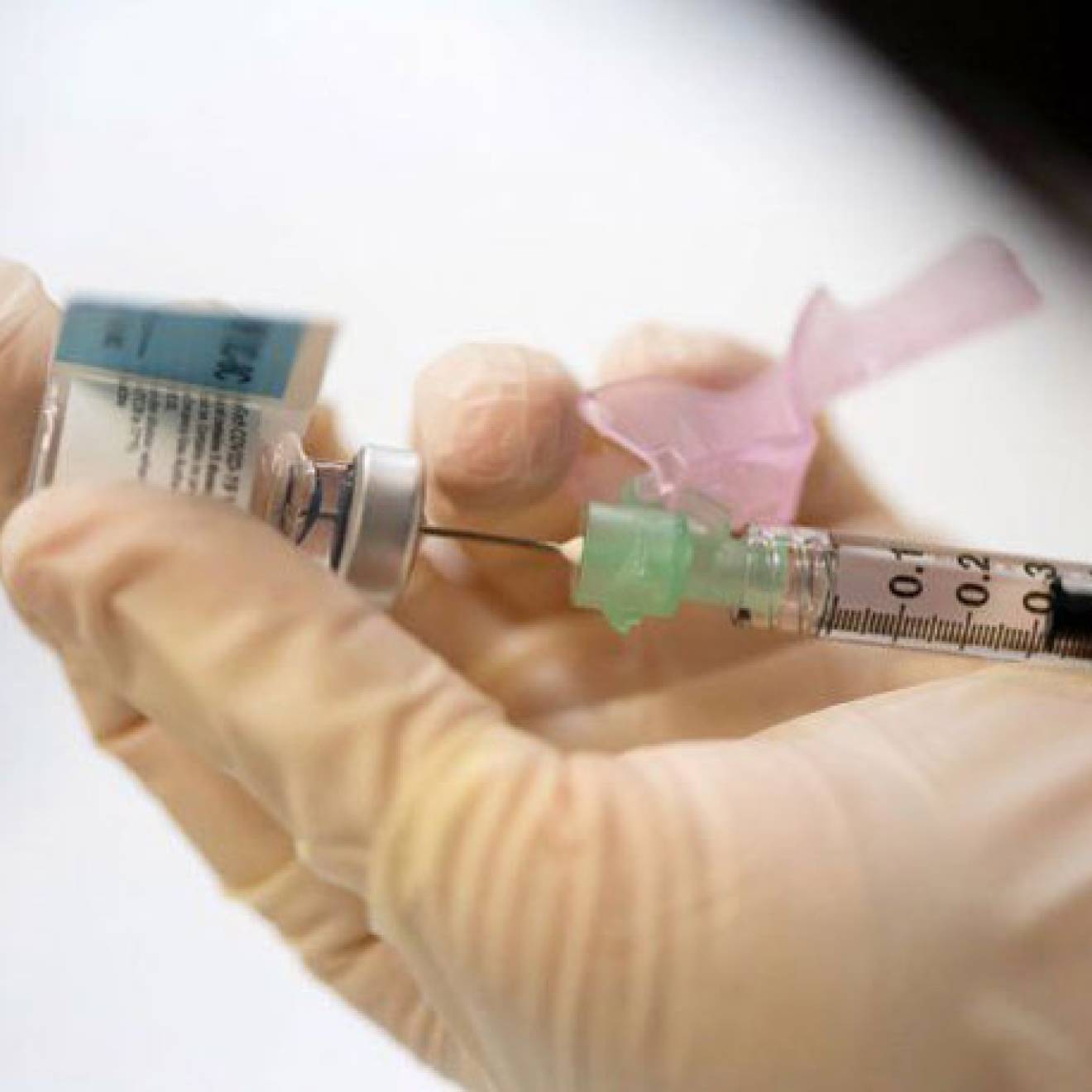 Vaccine syringe by Susan Merrell