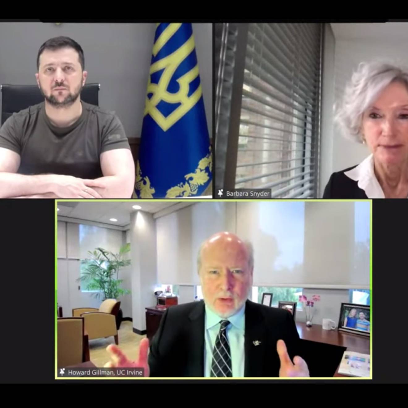 Zoom meeting between Ukrainian President Volodymyr Zelenskyy and AAU members. UC Irvine Chancellor Howard Gillman speaking to Zelenskyy while AAU President Barbara Snyder moderates.