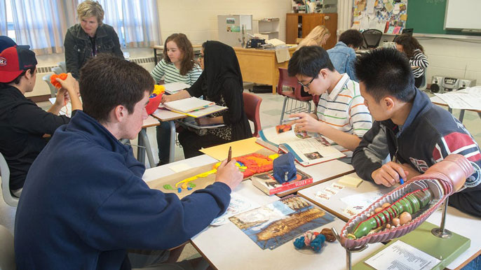 Teens sitting in a classroom