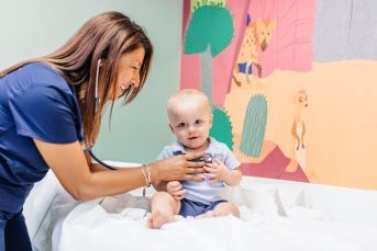 Child during healthcare visit at University of California Health location