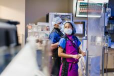 UCH medical professionals preparing for a procedure in a catheterization lab.