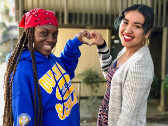 Guardian Scholars fistbump