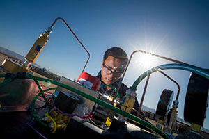 student works on rocket engine