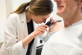 Doctor examining a patient