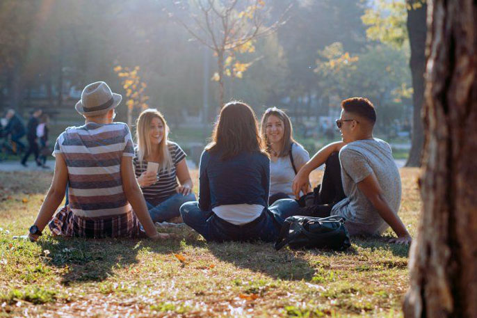 Young people picnicking