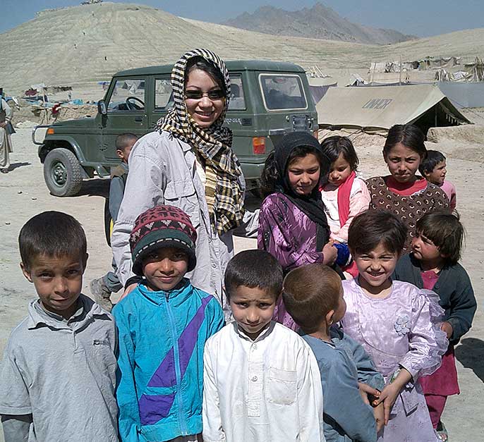 Tigon Abalos with Afghan kids