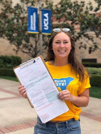 UC San Diego student registers a voter