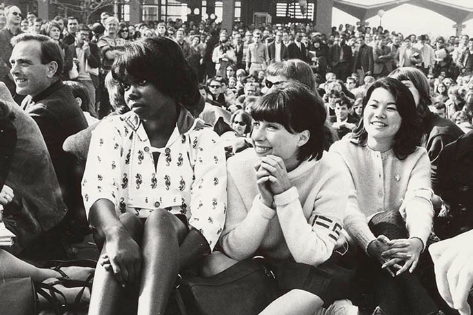 A group of women sitting on Sproul Plaza