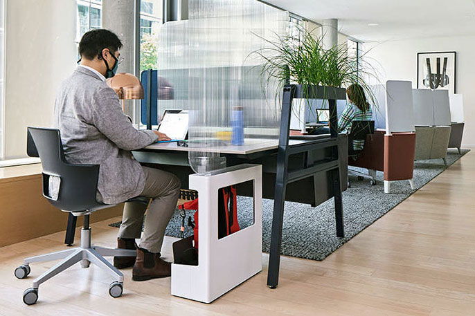 Man working in airy cubicle